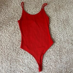 Red body suit